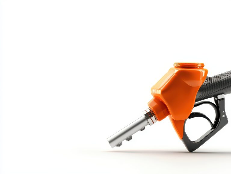 A close-up image of a fuel pump nozzle, predominantly orange, lying on a white background, emphasizing the subject's sleek design