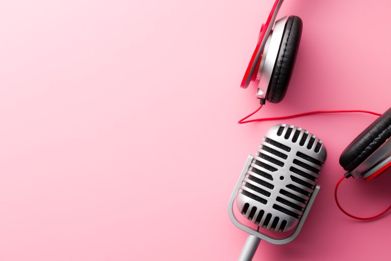 vintage silver microphone and headphones